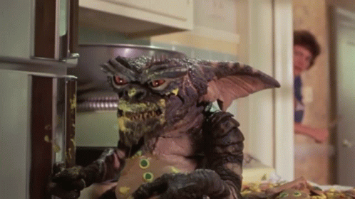 Gremlin Eating Cheese