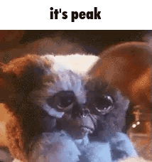 Gremlin Toy with Sharp Claws and Red Eyes
