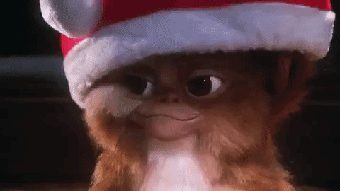Gremlin Wearing Santa Hat Smiling