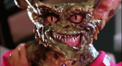 Gremlin with Red Eyes and Pink Shirt