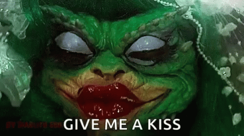 Gremlins Creepy Kiss Blink GIF