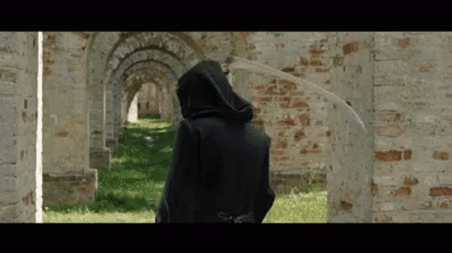 Grim Reaper Holding Scythe Turning Around GIF