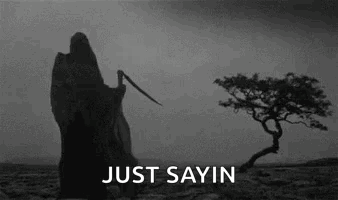 Grim Reaper In Desert With Scythe