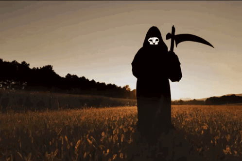 Grim Reaper Standing in Front of Desert Tree
