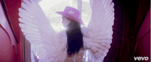 Grimes With Angel Wings GIF