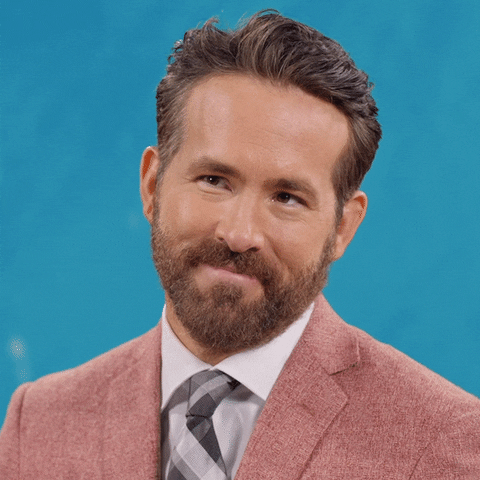 Ryan Reynolds Grin GIF