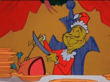 Grinch Cutting Sausage