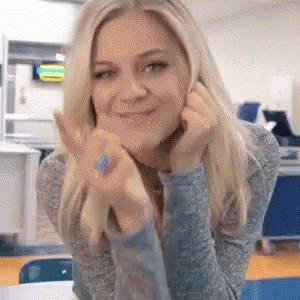 Grinning Girl Finger Circles GIF