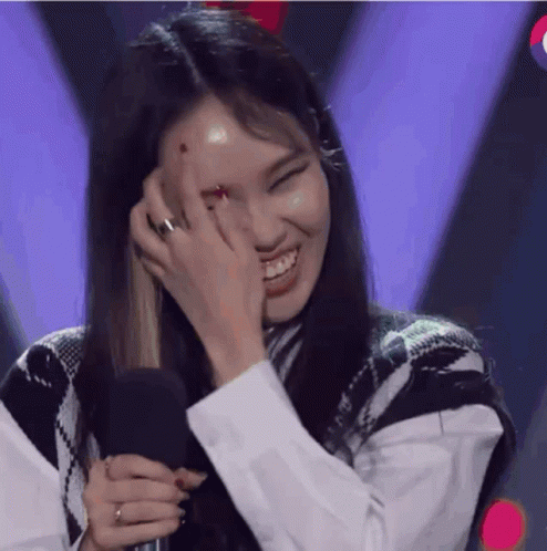 Grinning Girl Hiding Over Thin Hair GIF