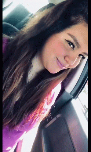 Grinning Girl Shy Car Video GIF