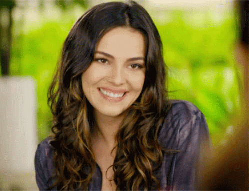 Grinning Girl Slow Wink GIF