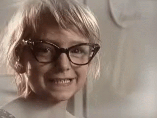 Grinning Girl With Eyeglasses GIF