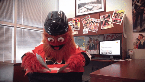 Gritty Throwing The Paper GIF