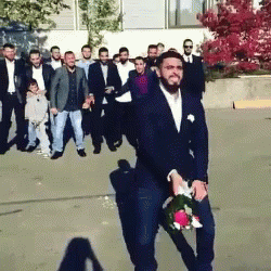 Groom Bouquet Toss GIF