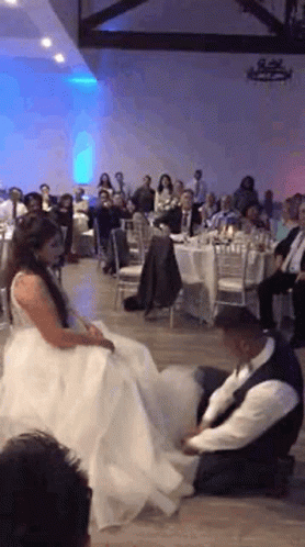 Groom Under Bride's Gown GIF