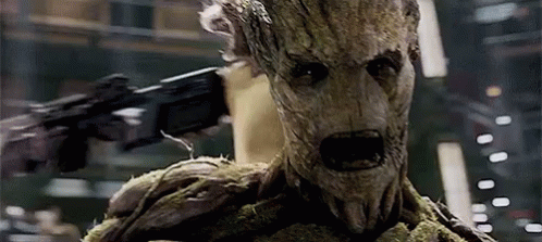 Groot Holding Gun and Looking