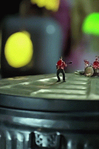 Miniature People Groovy On Tin Can GIF