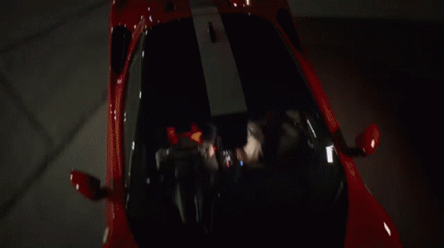 Group Around Table With Jack Daniel's Bottle GIF