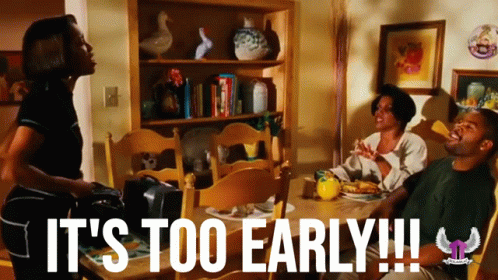 Group at Table Saying It's Too Early