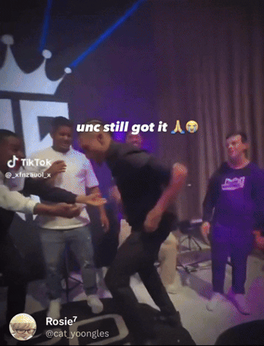 Group Dancing in Dark Room Unc Still Got It