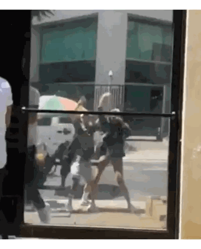 Group Dancing in Front of Building