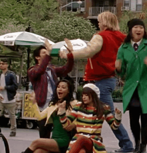 Group Dancing in Front of Ice Cream Cart