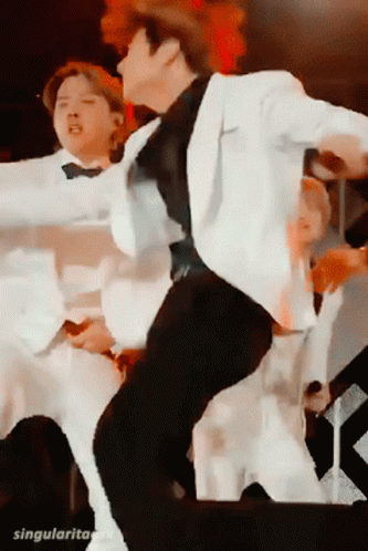 Group Dancing, One Singing On Stage GIF