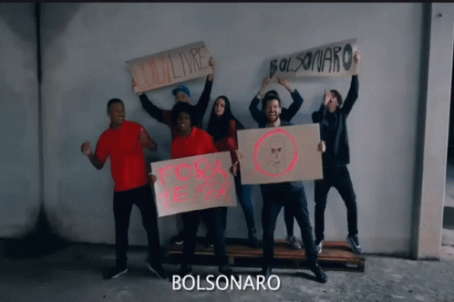 Group Holding Bolsonaro Signs