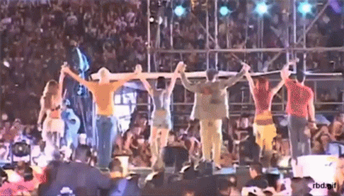 Group Holding Hands on Stage with RBD.NR.F
