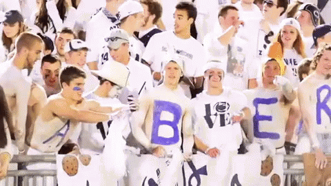 Group Holding Signs That Say Beer GIF
