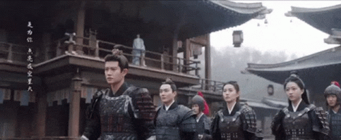 Group In Armor In Front Of Building With Chinese Writing GIF