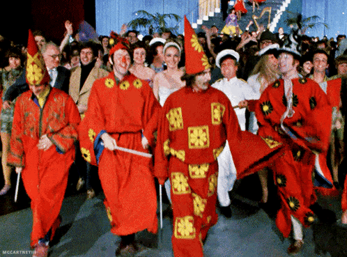 Group in Red and Yellow Costumes Dancing