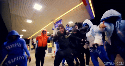 Group In Trapstar Sweatshirts Dancing At Gas Station GIF