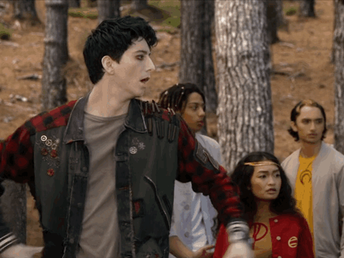 Group in Woods With Plaid Shirt Letter P
