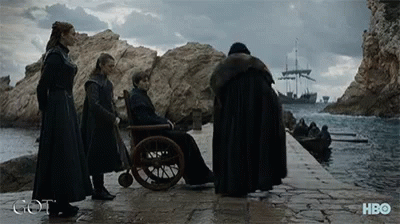 Group Near Wheelchair Man HBO Logo