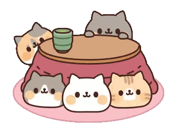 Group of Cats Sitting Around Table