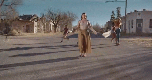 Group Of Dancers In Ghost Town GIF