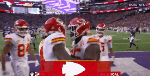 Group of Football Players Hugging