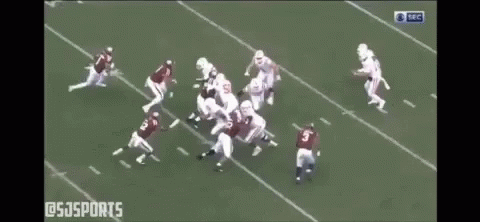 Group of Football Players Playing