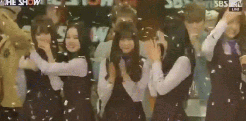 Group of Girls Dancing at SBS TV Sign