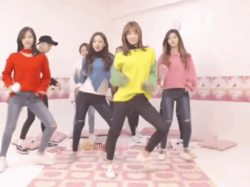 Group of Girls Dancing on Pink Rug