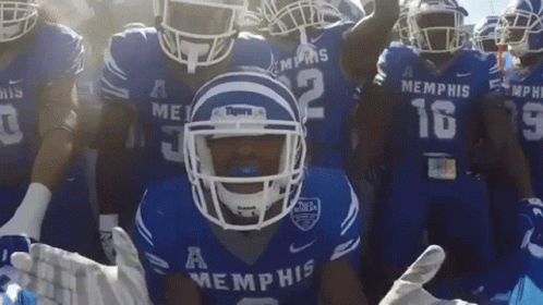 Group of Memphis Football Players in Blue Uniforms