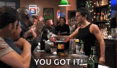 Group of Men Drinking Beer at Bar with Bartender