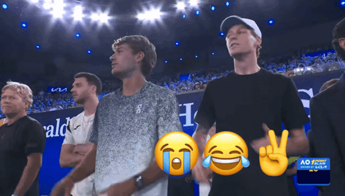 Group of Men in Front of AO Sign
