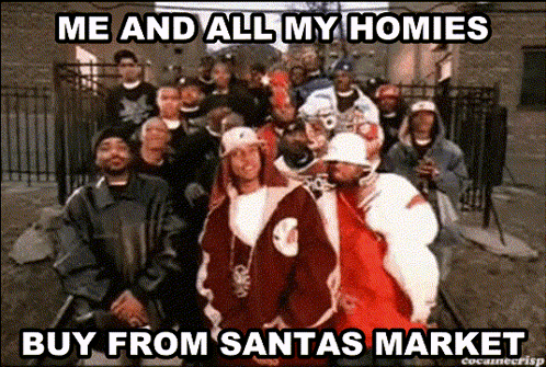Group Of Men In Front Of Fence Saying Me And All My Homies Buy From Santas Market GIF