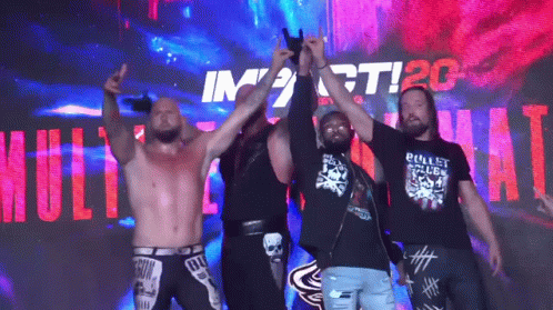 Group of Men in Front of Impact Sign