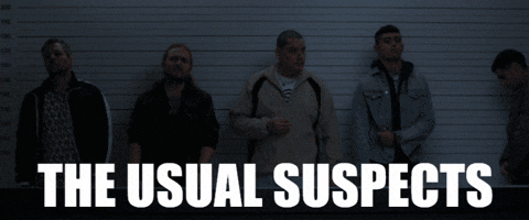Group of Men in Front of Wall The Usual Suspects