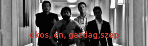 Group Of Men In Hallway With Okos En Gazdag Szep GIF