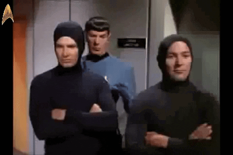 Group of Men in Hooded Suits