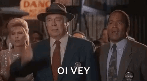 Group Of Men In Suits Standing Together GIF